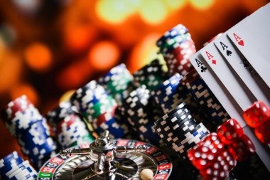 Live casino dealer at blackjack table with multiple camera angles